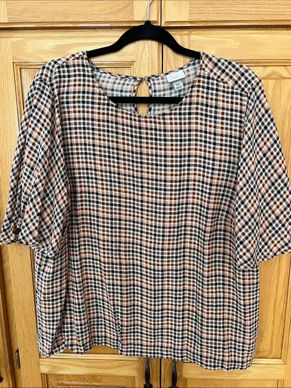 Checked Short-Sleeve Blouse in Black and Brown. A Nee Day